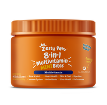Orange plastic jar of Zesty Paw 8-in-1 Multivitamin Mini Bites with orange ribbed cap, chicken flavor label, and benefit icon