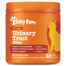 Orange jar of Zesty Paws Urinary Tract Bites for cats with yellow cat illustration and bacon flavor label.